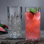 Pasabahce Nick & Nora glasses in use, one filled with a pink cocktail and garnish, featuring a cut diamond lattice pattern on clear crystal.