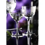 Close-up of two Utopia Raffles Vintage Nick & Nora glasses with faceted crystal bowls and short stems, filled with clear liquid and garnished with blackberries and mint.