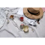Ryner Glass Melody Chianti 375ml wine glass in use with red wine, shown in a flat-lay with a second empty glass and casual props.