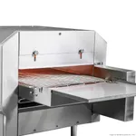 Bakermax Hx 14EP electric conveyor pizza oven close-up showing open front, wire mesh belt, and orange rotary knobs