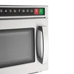 Close-up of the Apuro Heavy Duty Programmable Compact Microwave Oven control panel with red stop and green start buttons next to the glass door.