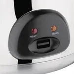 Close-up of the Apuro Jumbo Rice Cooker's front panel, featuring a glossy black oval faceplate with red and amber indicator lights on a stainless-steel body.