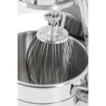 Close-up of the Apuro Digital Planetary Mixer's stainless steel bowl with a wire balloon whisk attached to the central drive shaft.