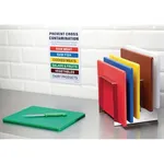 Hygiplas tiered stainless steel chopping board rack in use holding five colour-coded boards next to a cross-contamination sign