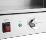 Close-up of the Apuro Counter Top Electric Griddle control panel featuring a black rocker switch and chrome temperature dial on brushed stainless steel.