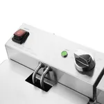 Close-up of the Apuro Double Fryer control panel showing a red switch, green light, and temperature dial