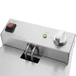 Close-up of the Apuro Single Fryer control panel featuring a red switch, green light, and white dial on brushed stainless steel.