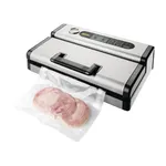 Apuro Vacuum Pack Machine in use, three-quarter view of stainless steel unit sealing a bag of cured meat