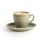 Olympia Kiln Moss saucer in pale green glaze with speckled brown rim, shown in close-up supporting a matching ceramic cup