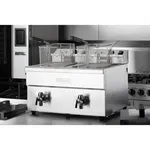 Apuro Double Induction Fryer close-up showing two wire baskets in open tanks and front drain valves