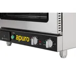 Close-up of the front-left corner of the Apuro Convection Oven with Steam, showing the black control panel, yellow logo, and rotary dials.