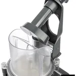 Close-up of the Dito Sama Prep4you Vegetable Slicer showing the grey pusher handle and clear collection bin with internal divider.