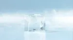 Close-up of a single clear cube of ice produced by the Hoshizaki 83KG Counter Fit-In Cuber