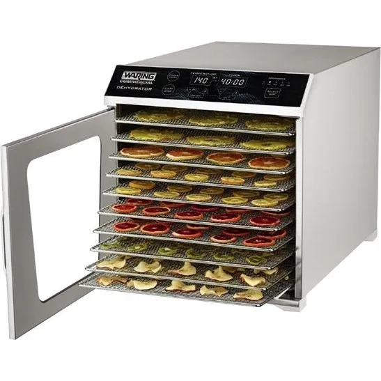 Waring Commercial Dehydrator - 10 Tray, three-quarter view with open door revealing stacked wire-mesh trays holding sliced fruit and vegetables.