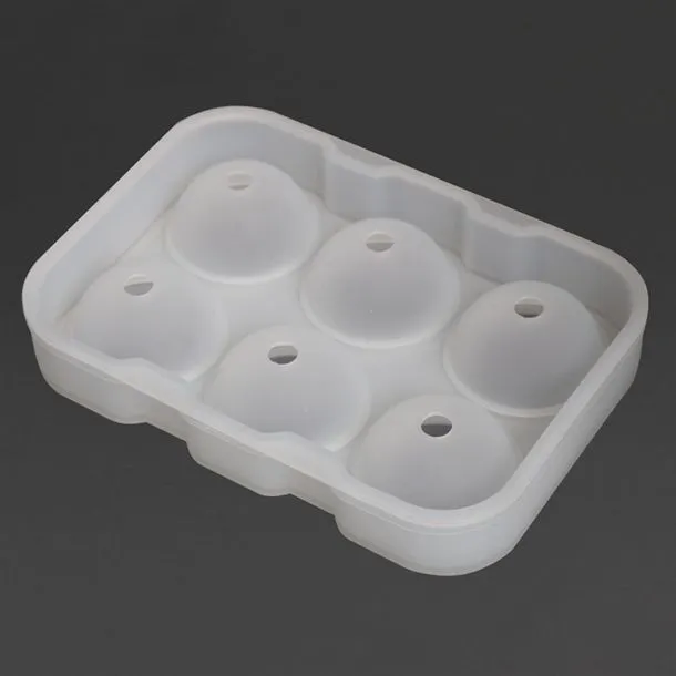 Close-up of the Beaumont Silicon Ice Ball Mould, a white flexible tray with six spherical cavities and small apex openings.