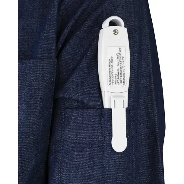 Hygiplas Digital Stem Thermometer close-up clipped to a denim apron, showing the white housing with printed measurement range and accuracy specs.