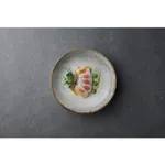Churchill Round Plate-Coupe 288mm in use, overhead view of speckled grey rim holding a plated fish dish
