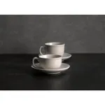 Dudson Mug-320ml ceramic cups in off-white with C-shaped handles, shown as a pair on saucers in a lifestyle setting