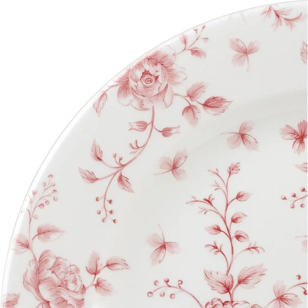 Close-up of the Churchill Round Plate-170mm Ø showing the glossy white rim and hand-painted dusty pink rose and butterfly pattern.