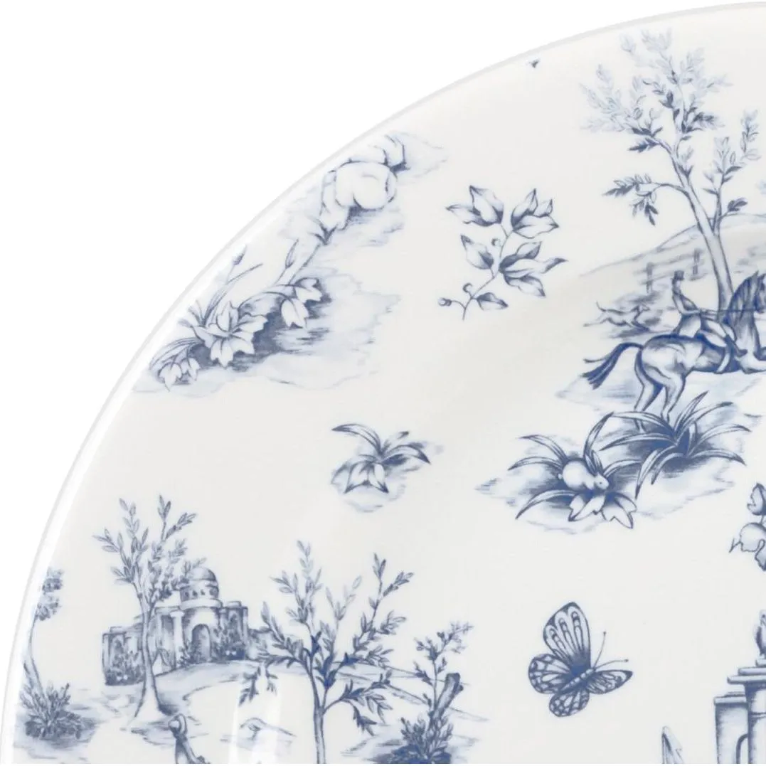 Close-up of the Churchill Round Plate-305mm Prague Toile showing the blue toile pattern with a horse, butterfly, and domed building on white ceramic.